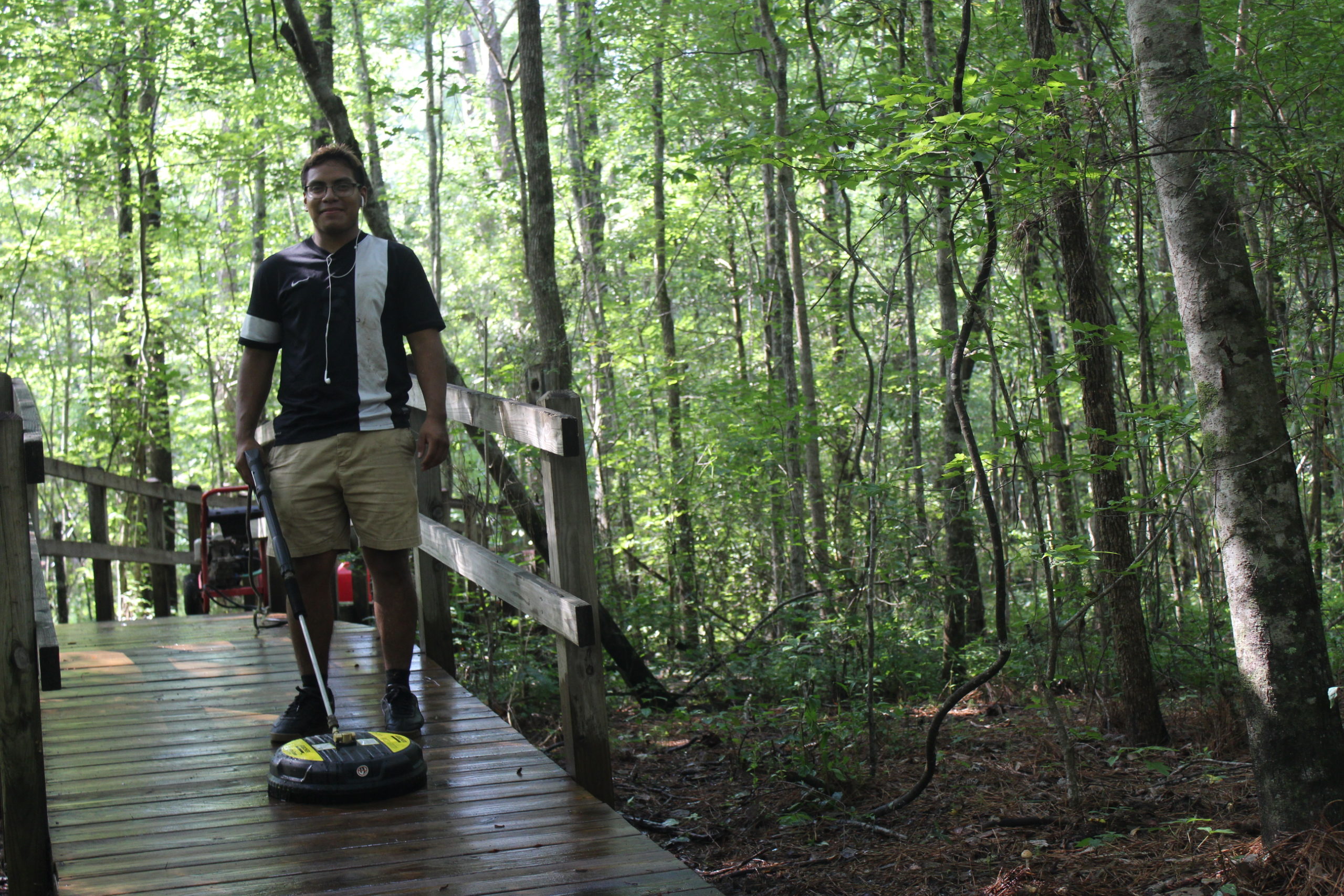 David Pressure-washing the board walk