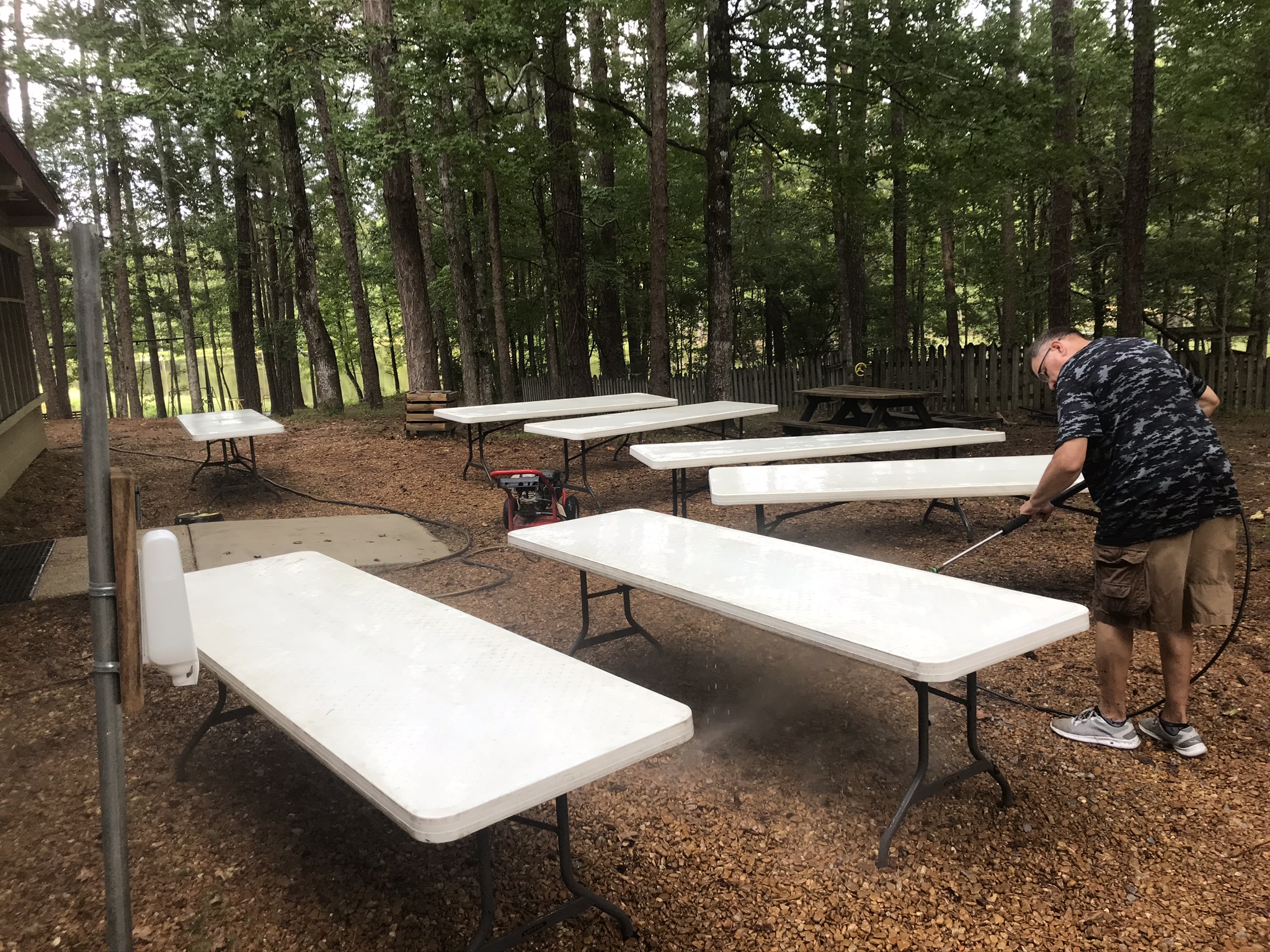 The Pavilion tables gleam after being pressure washed