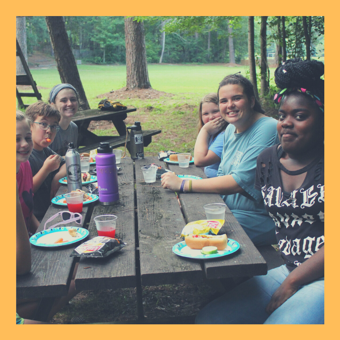 Campers at a supper cookout