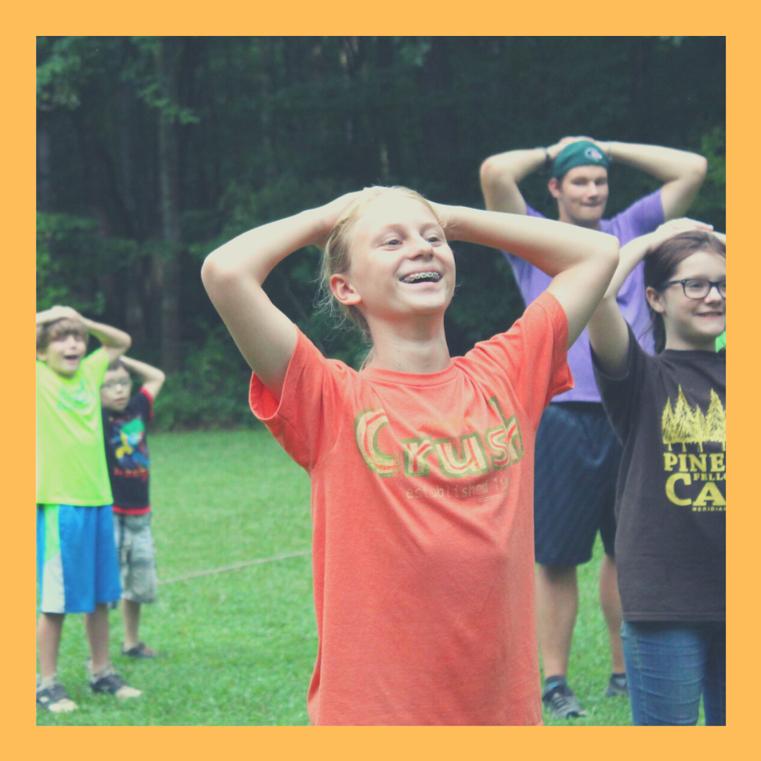 Campers playing a game on the rec field